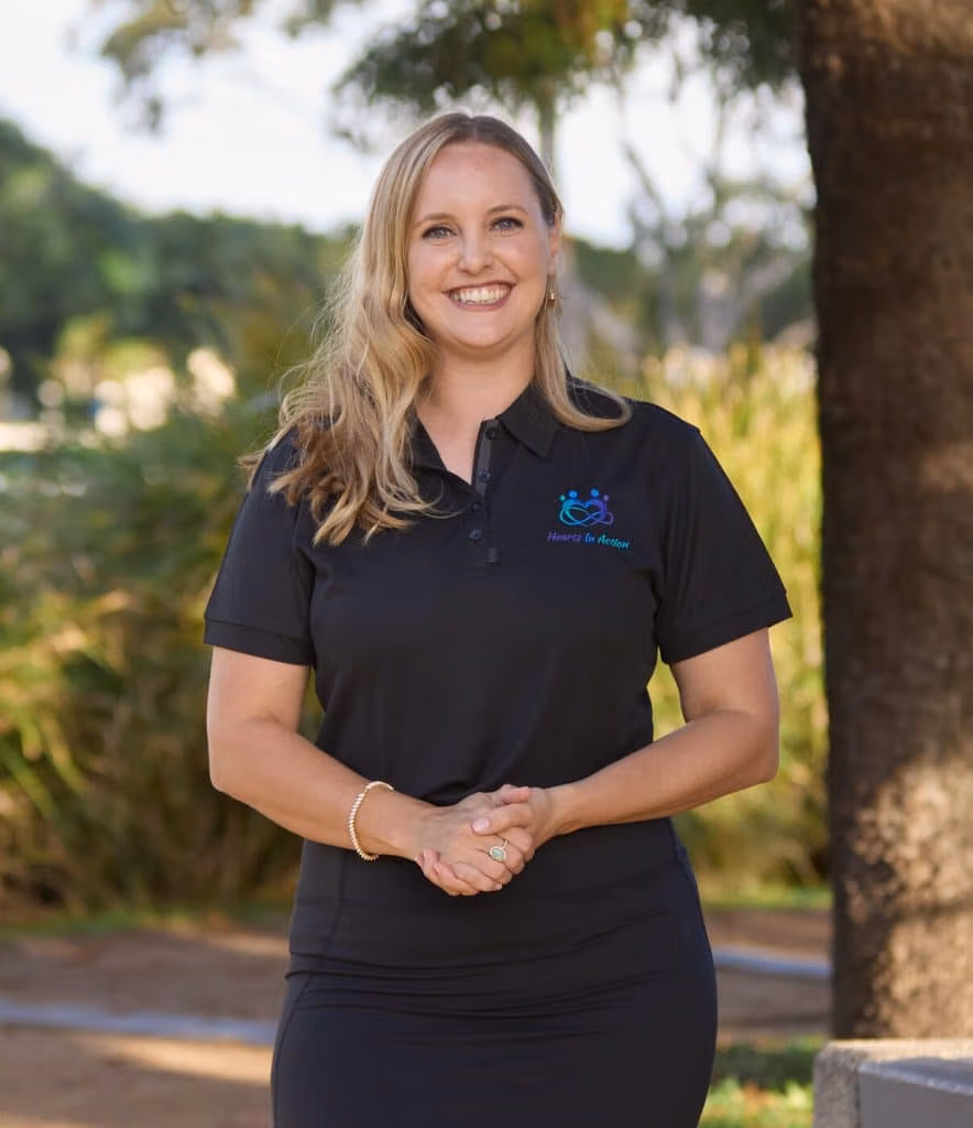 Grace Saxen from Hearts In Action smiling outdoors